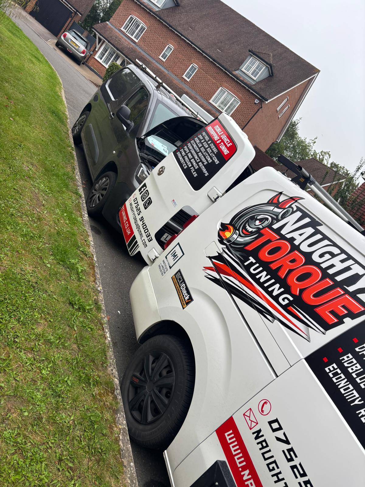 Naughty Torque Tuning mobile remapping van on a customer's driveway in Surrey